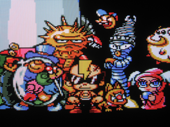 PC Denjin poses with his crew, a murderer's row of wacky weirdos. One of them seems to be a sentient baseball. Another, a whistling mummy. The others so strange that one struggles to describe them. What's up with that dog's face.