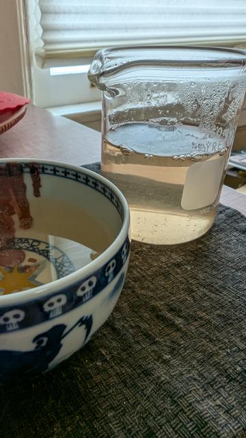 Green tea in a curious bowl