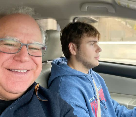 Governor Tim Walz and his son and first son of Minnesota, Gus Walz together in a car