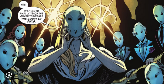 Panel from a Batman comic, of The Court of Owls. A woman is putting on an owl mask as she says, "Yes. It's time to finally teach the Joker to beware The Court of Owls."