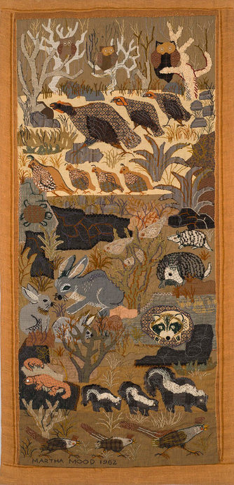 long vertical textile, appliqué with beads, depicting numerous wild animals native to Texas together in a composite native landscape, including owls, turkey vultures, quail, ground doves, roadrunners, rabbits, skunks, armadillo, opossum, raccoon, tortoise, and a pair of either lizards or salamanders (chonky orange bodies that vaguely resemble gila monsters, which are not native to Texas; also spotted, so possibly meant to be central newt efts?) artist name and date stitched in bottom left predominant color palette of brown earth tones (animals with stylized but correct colorations)