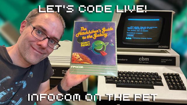 Me in front of my Commodore PET setup, with disk drive, holding up a boxed copy of Infocom's Hitchhiker's Guide to the Galaxy.