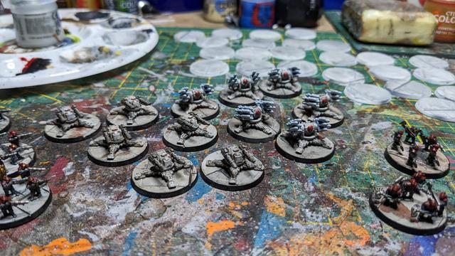 In the middle you can see 6 bases with rocket tarantulas and 6 bases with laser tarantulas. Tarantulas are guns with static legs. The underground is a green cutting mat.