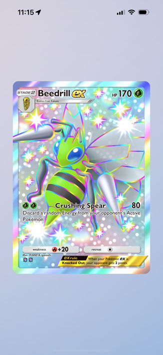A double shiny rare (I don’t make the names) Beedrill EX in Pokémon TCG Pocket. It’s a full art card of a shiny beedrill covered in shines and sparkles. The beedrill itself is outlined with a rainbow holo effect