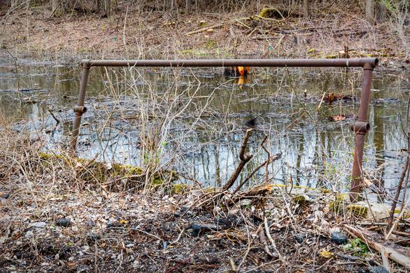 Iron railing alongside abandoned rail at Vacuum Oil
