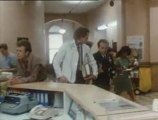 A screen shot from the television series St. Elsewhere, highlighting actor David Morse.  You can see a microphone peak down from the top right of the screen.