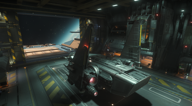 Star Citizen Screenshot, eine Drake Corsair mit eingeklappten Flügeln im Hangar.