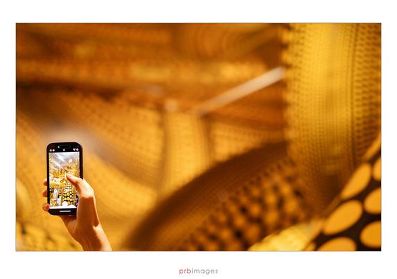 I finally got around to seeing the Yayoi Kusama exhibition a few days before it closed here in Melbourne. I took quite a few photos of the artworks - no doubt the same photos that everyone else took! - but I still liked some of them and will post a few here.

The installation in the background here is &quot;The Hope of the Polka Dots Buried in Infinity Will Eternally Cover the Universe&quot;.

The exhibition was one of the most comprehensive retrospectives of the artist ever presented globally, featuring painting, sculpture, collage, fashion, film and installation. It was held at the NGV International gallery in Melbourne, Australia, from December 2024 to April 2025.

<a href="https://www.flickr.com/cameras/sony/ilce-7c/">Sony A7C / ILCE-7C</a>
Sony FE 85mm F1.8
85mm; 1/100 sec; f/2.8; ISO 2500