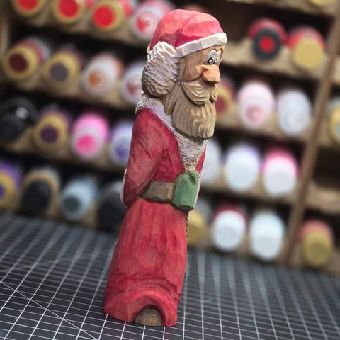 Hand carved Santa side view