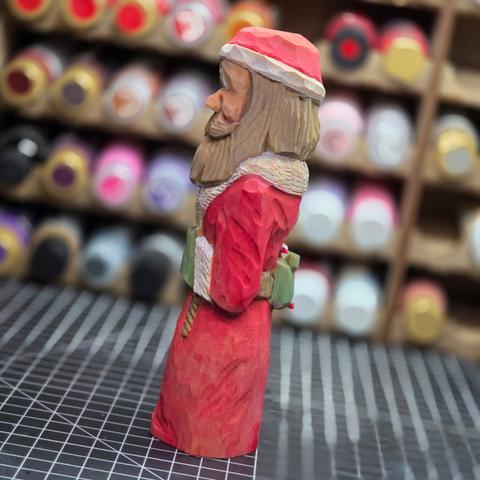 Hand carved Santa, side view