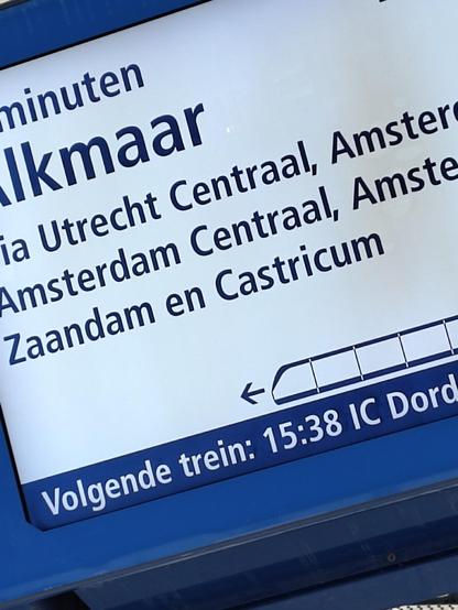 Train information board showing the departure of the train to Amsterdam Centraal en Alkmaar