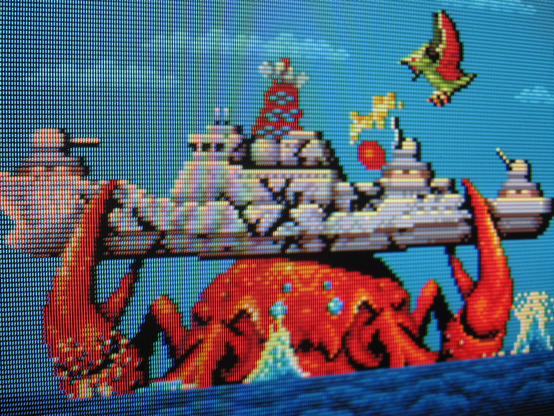 A giant enemy crab lifts a battleship out of the water with its deadly pincers! Gaurodan, predictably, sprays lighting breath at it.