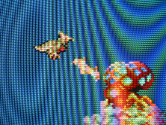 A giant alien fungus grows from a building. Gaurodan aint having none of that. They spray it with lightning breath.