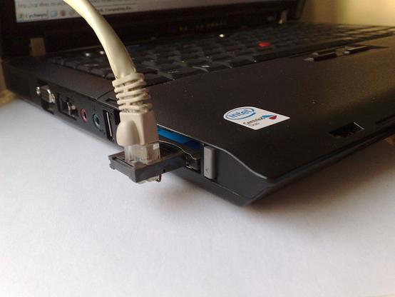 xjack Ethernet connector in use. it looks very stupid and the cable just hangs out the top