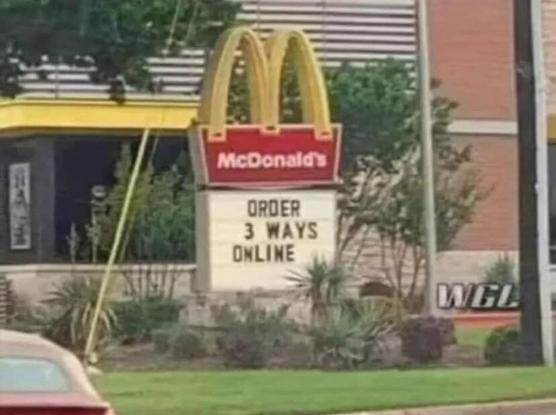 Sign in front of a McDonald's: 
order 3 ways online!
