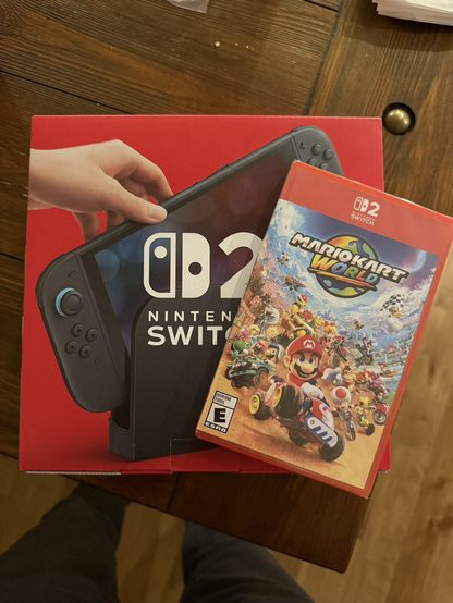 Nintendo Switch 2 box with Mario Kart World box on top from GameStop midnight launch