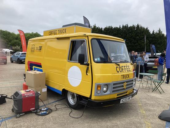Yellow Peugeot J9 converted for use as a catering van, front quarter view
