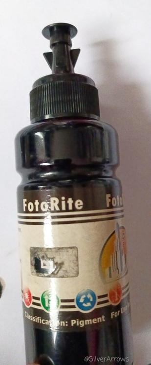 Fotorite brand of black refill ink bottle, showing type of ink as pigment, rather than dye.