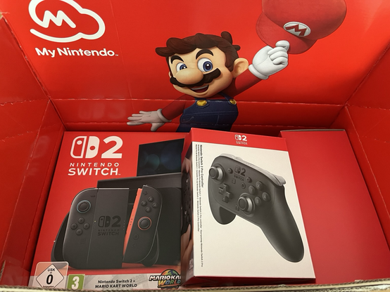 Nintendo Switch 2 with controllers in box.