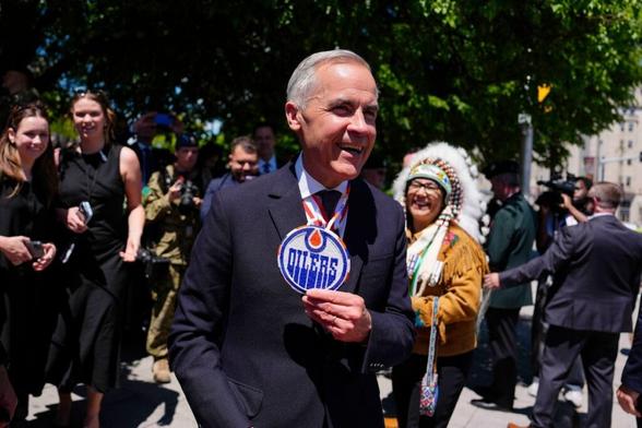 Mark Carney is rooting for his hometown Oilers