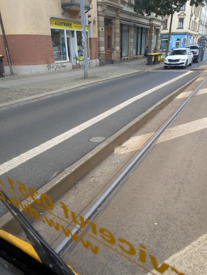 A raised street next to the tram tracks to allow for level boarding with trams.