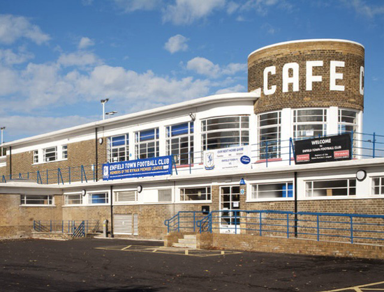 A colour photograph of the streamlined Queen Elizabeth Stadium in Enfield