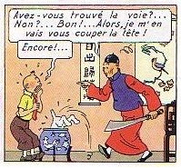 Une case de la bande dessinée de Tintin. Tintin fait face à Didi Whang, tandis que Milou saute dans l'aquarium.

Tintin est surpris des propos étranges de son assaillant interlocuteur : « Avez-vous trouvé la voie ? ... Non ? ... Bon ! ... Alors, je vais vous couper la tête ! »