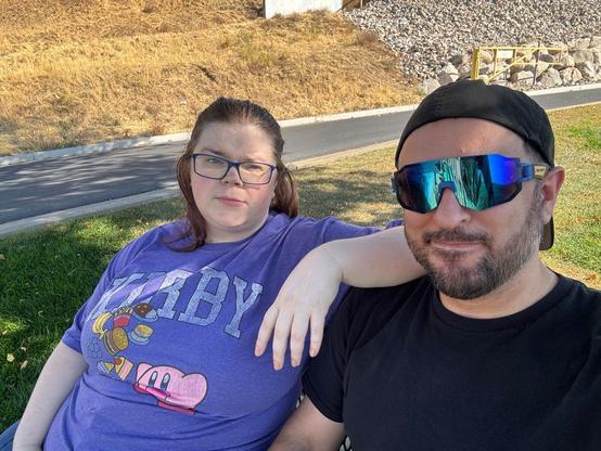 A much more recent selfie of my wife and I. She's tolerating me being a dork wearing some sunglasses I had just found at the park.