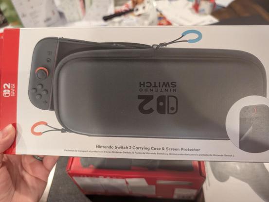A Switch 2 carrying case box showing that the switch 2 art is upside down compared to the label.