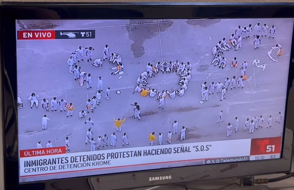 Immigrants detained at the Krome Detention Center in Florida are protesting being held in deplorable conditions by forming a giant SOS sign, by standing in formation, next to each other, that can be seen from above.