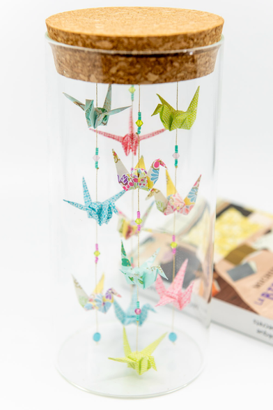 Volière de poche en origami dans les tons pastels