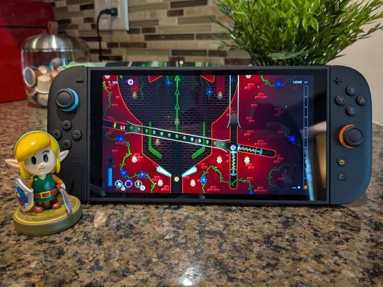 Photo of Pinball Spire on a Switch 2. There's a Link amiibo next to it.