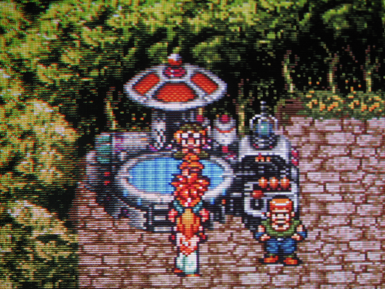 Lucca is shocked that Crono has a girl with him. Normally Crono prefers to spend his time studying the blade.