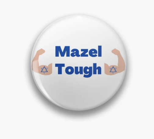 Mazel Tough is shown on a pin button.