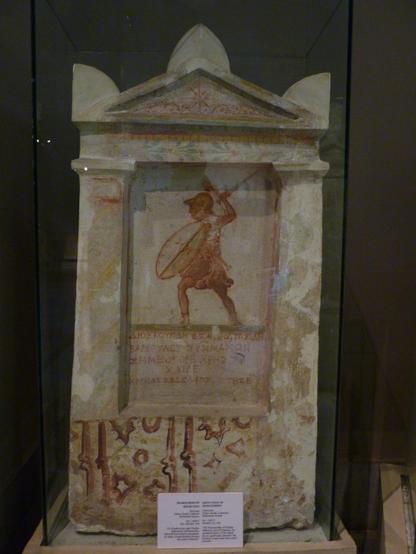 painted grave stele showing a Greek soldier