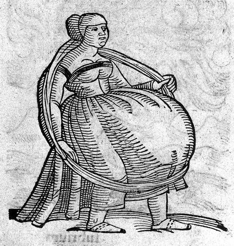 Black and white drawing of a very pregnant woman. Her bump is so large that it hangs below her knees, but it does not extend above the waist. The bump is supported by a large hoop which extends beneath it and around her shoulders. She has a rather annoyed expression.