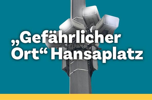 Eine Stele an der reihum Videokameras angebracht sind, die in verschiedene Richtung ausgerichtet sind. Über den Kameras steht als Schriftzug der Titel der Veranstaltung "Gefährlicher Ort Hansaplatz"