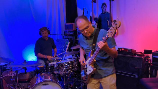 Two people playing instruments