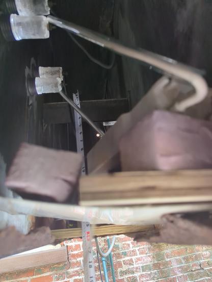 transformers now sitting on blocks of foam and wood with sleeve glass over the Silicone GTO wires keeping them taught and super insulated. Glass housings providing light (and water) into the sign cavity