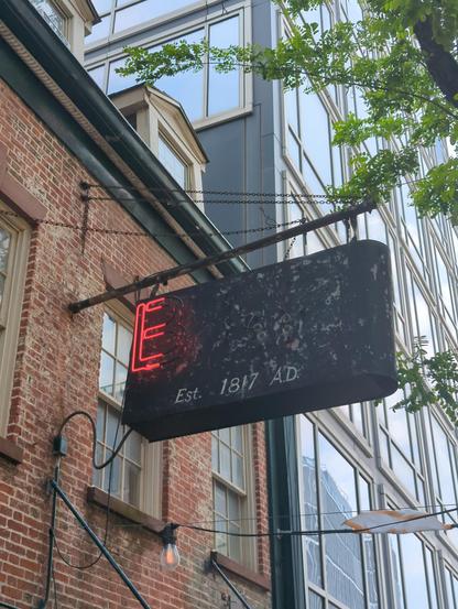 The Black EAR inn sign wioththe E and A all jumped out. Donald did the A and I did the R. I took both of the letters down myself though :). "EST 1817 AD" is painted below the neon in white lettering