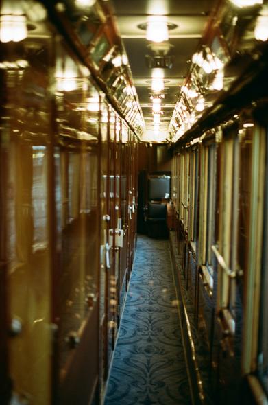 A 1920s luxury train corridor.