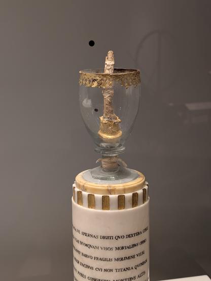 The finger in a glass egg, its top is removed, allowing a perfect look at the relic