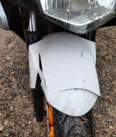 a broken front fender of a motorcycle