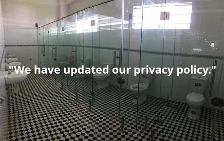 "We have updated our privacy policy" text with a photo of a toilet with glass walls.