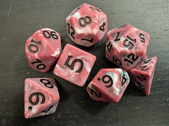 A set of seven dice which look like well-marbled beef. 

They do not feel like beef. Thankfully.