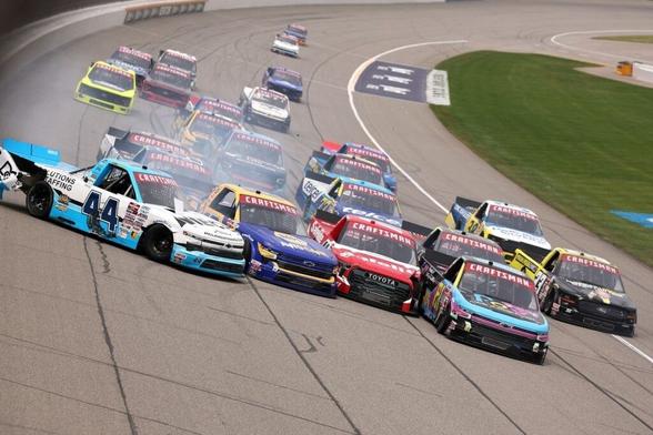 12 drivers crash in frenzied NASCAR Truck restart melee at Michigan