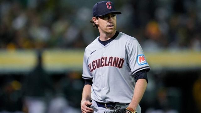 Cleveland Guardians' Shane Bieber walks to the dugout after pitching against the Oakland Athletics during the sixth inning of a baseball game Thursday, March 28, 2024, in Oakland, Calif. (AP Photo/Godofredo A. Vásquez)