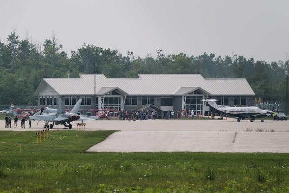 F-18 in front of the CYLS main building and terminal.