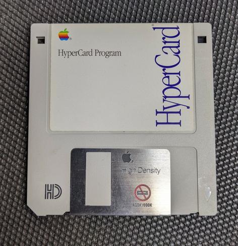 A 1.44MB 3.5" floppy disc with a vertically-oriented label reading "HyperCard."

Hypercard was developed by Bill Atkinson in 1987; Atkinson died of pancreatic cancer on June 5, 2025.