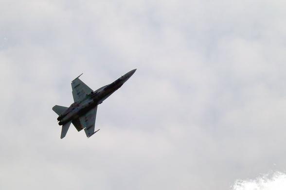 F18 Hornet jet fighter in a steep bank
